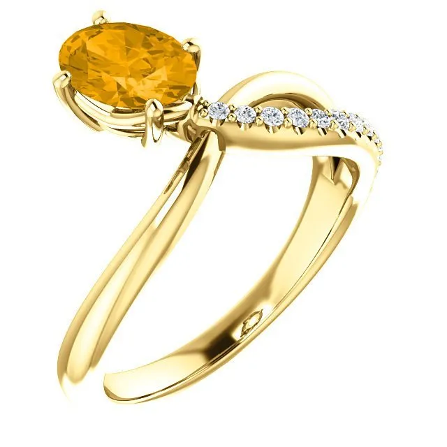 14KT GOLD 0.72 CT CITRINE & 1/10 CTW DIAMOND BYPASS RING