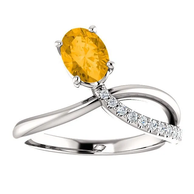 14KT GOLD 0.72 CT CITRINE & 1/10 CTW DIAMOND BYPASS RING