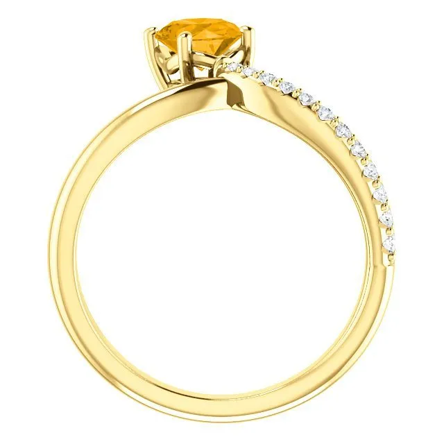 14KT GOLD 0.72 CT CITRINE & 1/10 CTW DIAMOND BYPASS RING