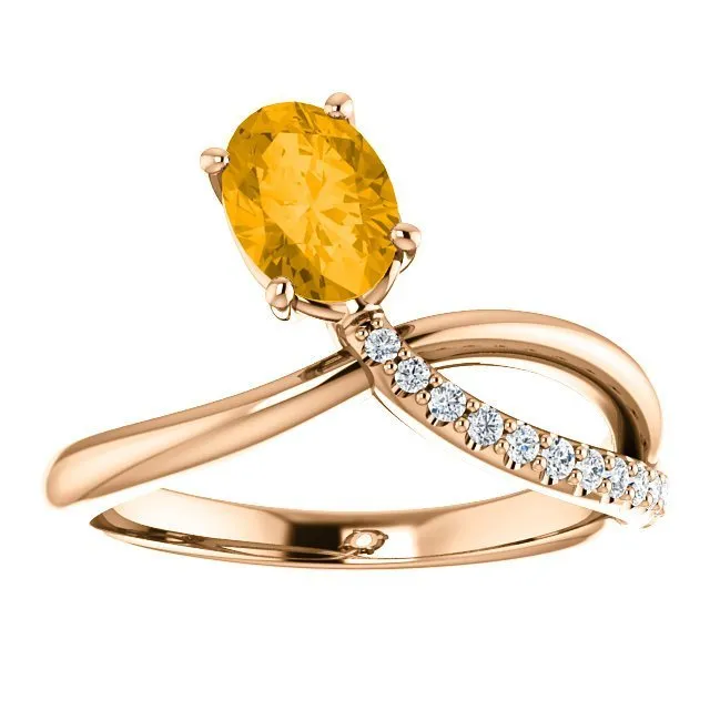 14KT GOLD 0.72 CT CITRINE & 1/10 CTW DIAMOND BYPASS RING