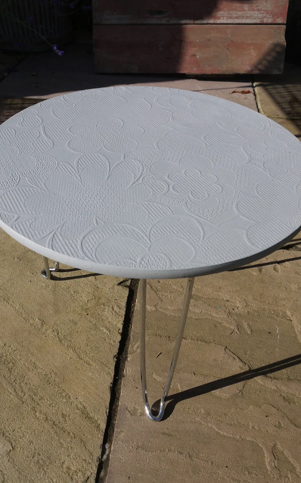 Upcycled retro round coffee side table with original 70's vintage wallpaper with chrome hairpin legs.
