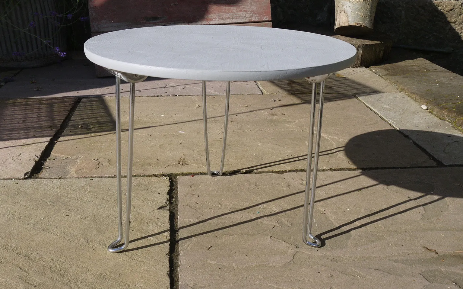 Upcycled retro round coffee side table with original 70's vintage wallpaper with chrome hairpin legs.
